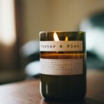 black votive candle shallow focus photography